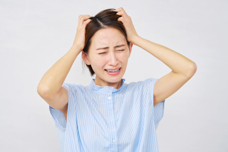 根管治療が失敗した女性