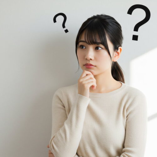 根管治療をしないとどうなるのか考える女性