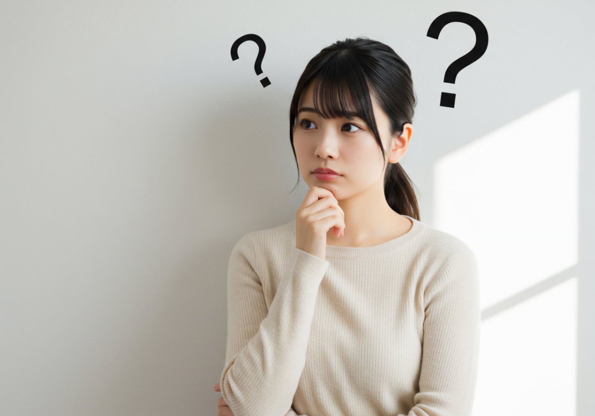 根管治療をしないとどうなるのか考える女性