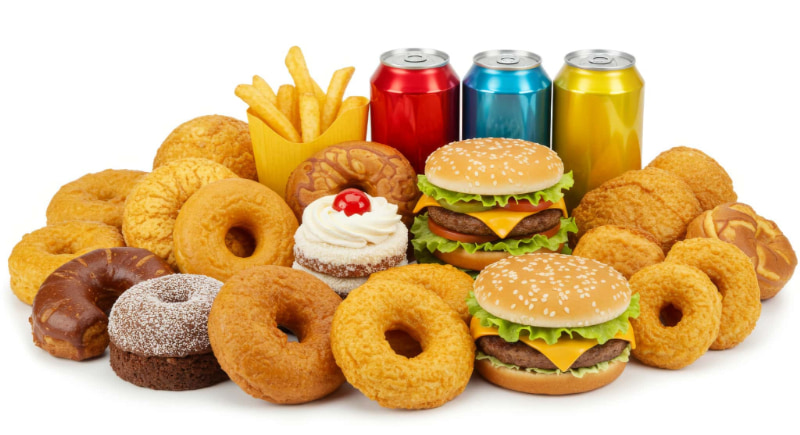 歯周病のリスクを高めるドーナツや炭酸飲料などの食べ物のイメージ